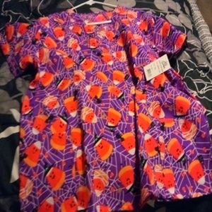 Candy corn scrub top